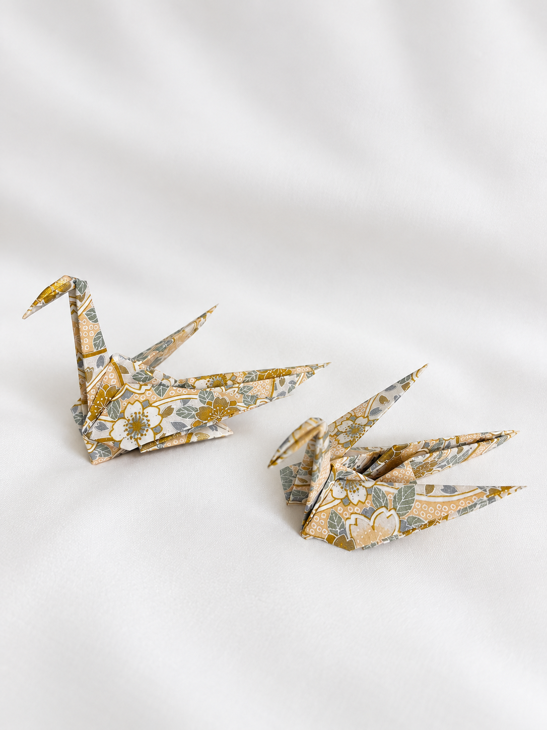 Gold and ivory washi origami crane place card holders, hand-folded in Japan