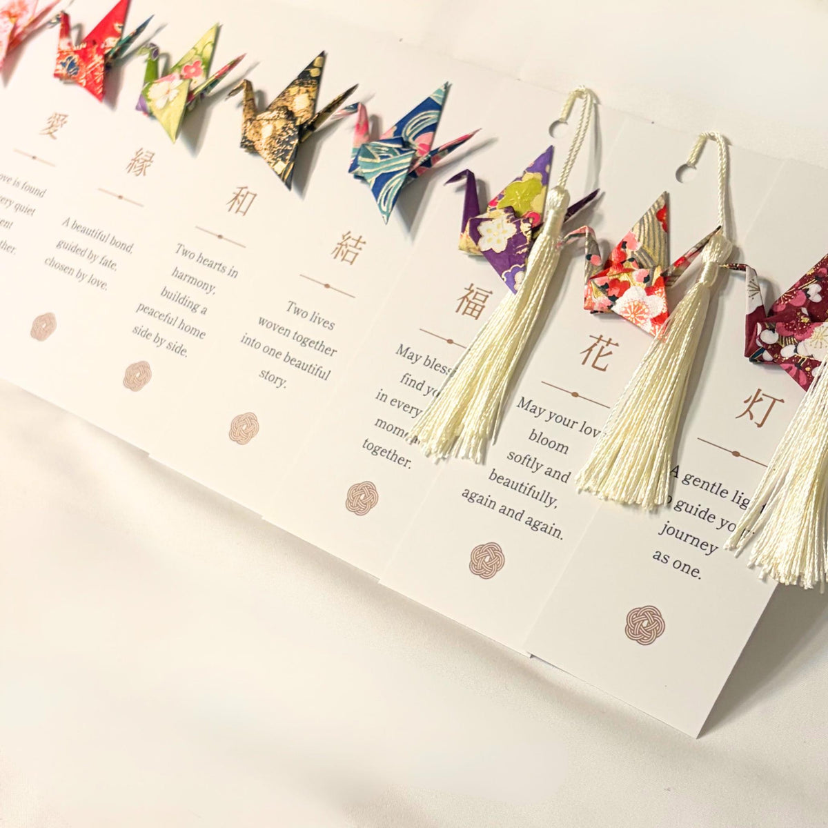 Japanese kanji blessing printed on a bookmark with its English meaning